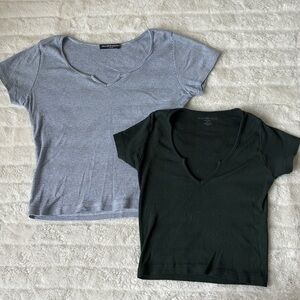 Two brandy baby tees.